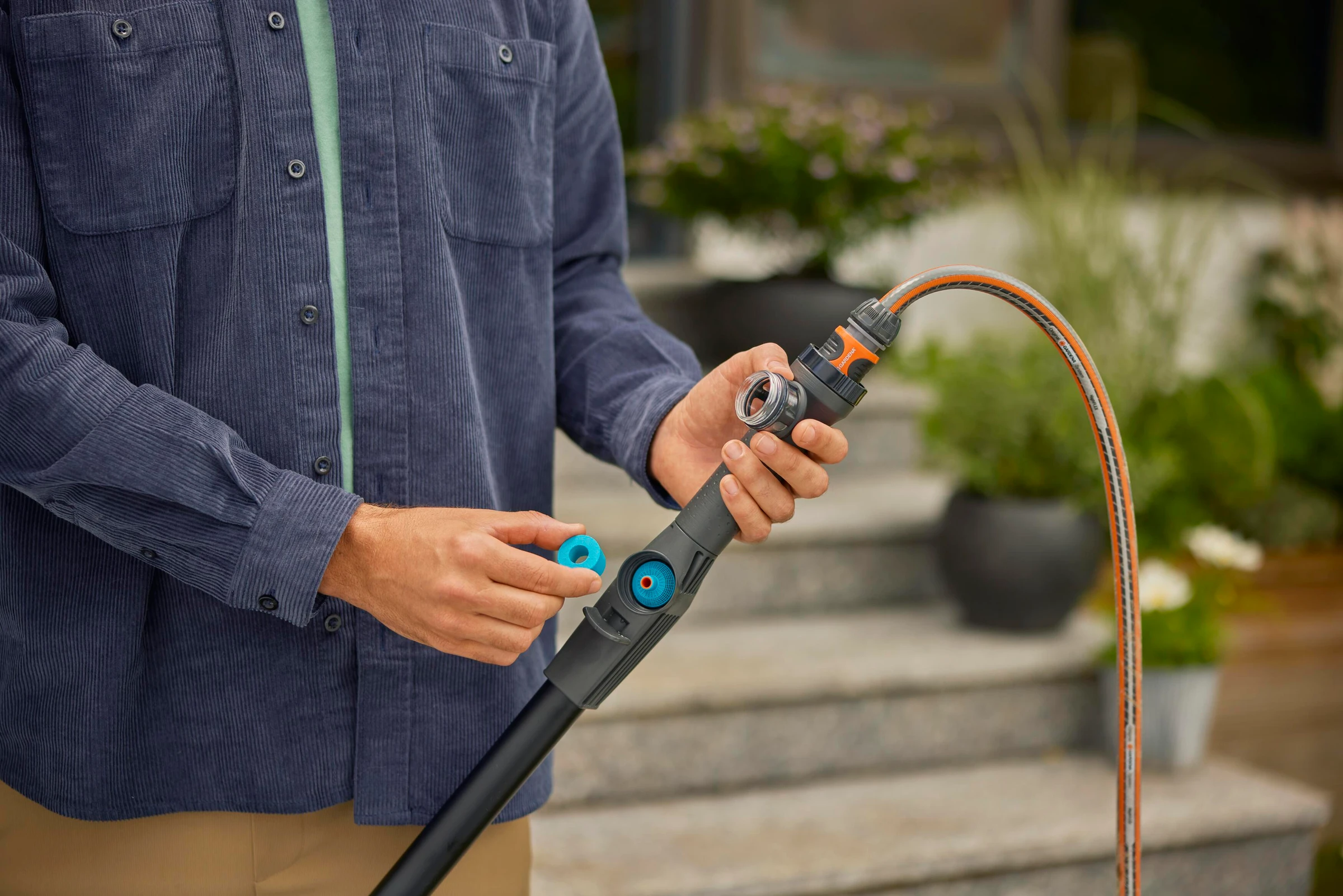 GARDENA Cleansystem Teleskop - Stiel M-XL, wasserführend für fernere Fläche